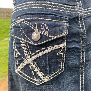 Denim mini skirt with detailed stitching.